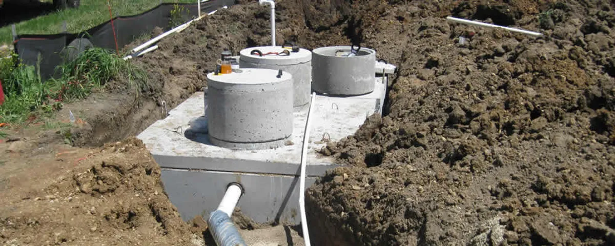 Septic system repair and installation site with tank access ports in Glendale, AZ