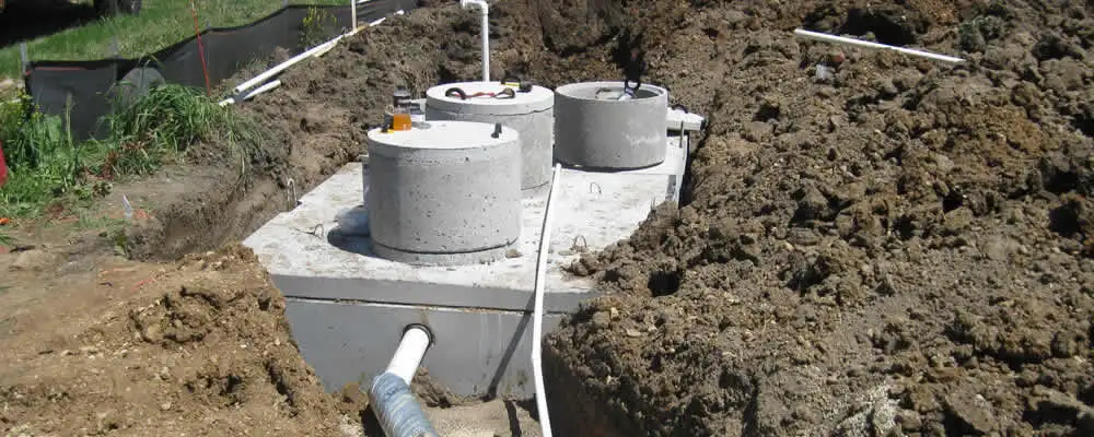 Septic system repair and installation site with tank access ports in Glendale, AZ